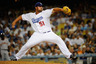 LOS ANGELES, CA - MARCH 31:  Jonathan Broxton #51 of the Los Angeles Dodgers throws a pitch in the ninth inning against the San Francisco Giants on Opening Day at Dodger Stadium on March 31, 2025 in Los Angeles, California.  (Photo by Kevork Djansezian/Getty Images)