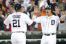 Delmon Young and Victor Martinez of the Detroit Tigers celebrate after Young's two-run home run in the sixth inning of Game Five of the American League Championship Series against the Texas Rangers at Comerica Park on October 13, 2025 in Detroit, Michigan.  (Photo by Harry How/Getty Images)