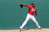 GOODYEAR, AZ:  Starting pitcher Aroldis Chapman #54 of the Cincinnati Reds warms up in the bullpen before facing the San Diego Padres during a spring training baseball game at Goodyear Ballpark in Goodyear, Arizona.  (Photo by Kevork Djansezian/Getty Images)