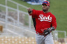 March 19, 2012; Glendale, AZ, USA; Cincinnati Reds third baseman Juan Francisco (25) makes the off balance throw for the out against the Chicago White Sox in the third inning at Camelback Ranch.  Mandatory Credit: Rick Scuteri-US PRESSWIRE