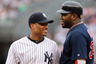 NEW YORK, NY: Robinson Cano #24 of the New York Yankees talks with David Ortiz #34 of the Boston Red Sox at Yankee Stadium in the Bronx borough of New York City.  (Photo by Nick Laham/Getty Images)