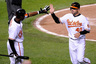 BALTIMORE - APRIL 27:  Rhyne Hughes #40 of the Baltimore Orioles is congratulated by Adam Jones #10 after scoring in the sixth inning against the New York Yankees at Camden Yards on April 27, 2025 in Baltimore, Maryland.  (Photo by Greg Fiume/Getty Images)