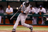 ST. PETERSBURG, FL:  Outfielder Chone Figgins #9 of the Seattle Mariners is jammed against the Tampa Bay Rays during the game at Tropicana Field in St. Petersburg, Florida.  (Photo by J. Meric/Getty Images)