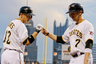 Pittsburgh, PA, USA; Pittsburgh Pirates shortstop Clint Barmes (12) greets left fielder Alex Presley (7) at home plate after Presley scored a run against the Houston Astros during the fourth inning at PNC Park. The Pittsburgh Pirates won 6-3. Mandatory Credit: Charles LeClaire-US PRESSWIRE