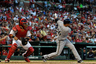 ST. LOUIS, MO -  Aramis Ramirez of the Milwaukee Brewers hits a base hit against the St. Louis Cardinals at Busch Stadium. (Photo by Jeff Curry/Getty Images)