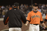 Manager Bruce Bochy of the San Francisco Giants takes the ball from pitcher Ryan Vogelsong taking him out of the game against the Atlanta Braves at AT&T Park in San Francisco, California.  (Photo by Thearon W. Henderson/Getty Images)