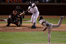 ARLINGTON TX - NOVEMBER 01: Vladimir Guerrero #27 of the Texas Rangers hits a pop-fly out against starting pitcher Tim Lincecum #55 of the San Francisco Giants in the second inning of Game Five of the 2010 MLB World Series at Rangers Ballpark in Arlington on November 1 2010 in Arlington Texas.  (Photo by Christian Petersen/Getty Images)